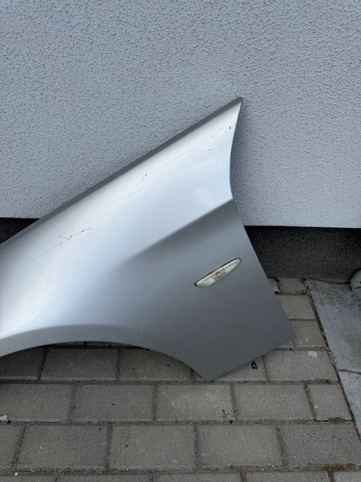 Błotnik przedni lewy BMW E91