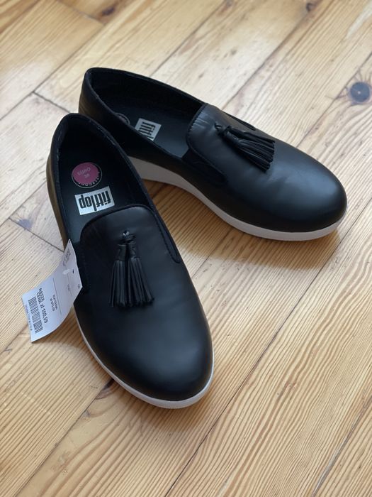 Лофери з китицями