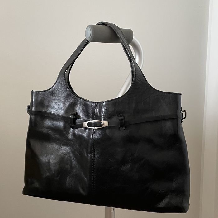 Mala de pele preta em muito bom estado