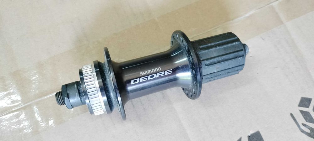 Piasta tylna na tył Shimano DEORE na 32 szprych