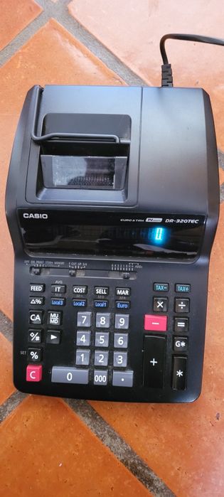 Maquina de calcular casio de rolo