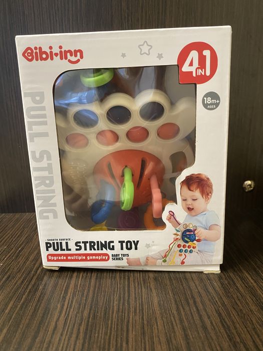 Розвиваюча іграшка бряскальце деревяна вежа