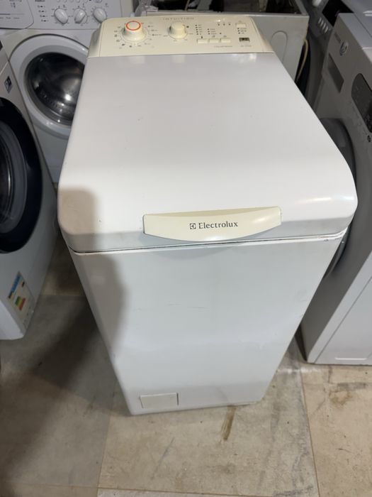 Стиральная машина електролюкс EWT 1020