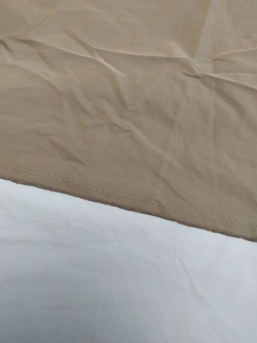 Ткань однотонная .голубого ,хаки ,красного цвета .  Ширина 145-150см.