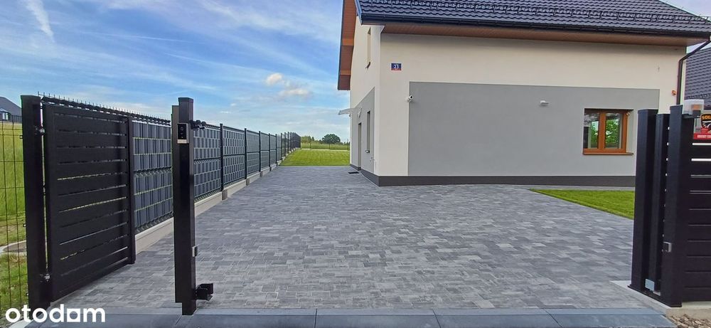 Nowy dom wolnostojący Szyce 170 m2 działka 8,46 ar ogrodzenie kominek