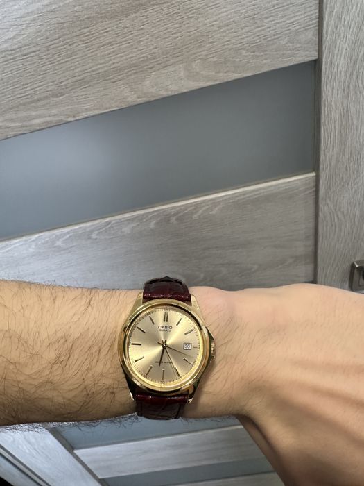 Zegarek Casio złoty bordowy pasek MTP-1183Q-9ADF
