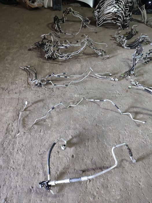 Трубка кондиціонера шланг Фольксваген Пассат Б6  Гольф Тауран Шкода