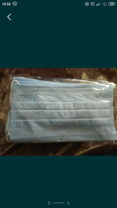 Голубая одноразовая маска .