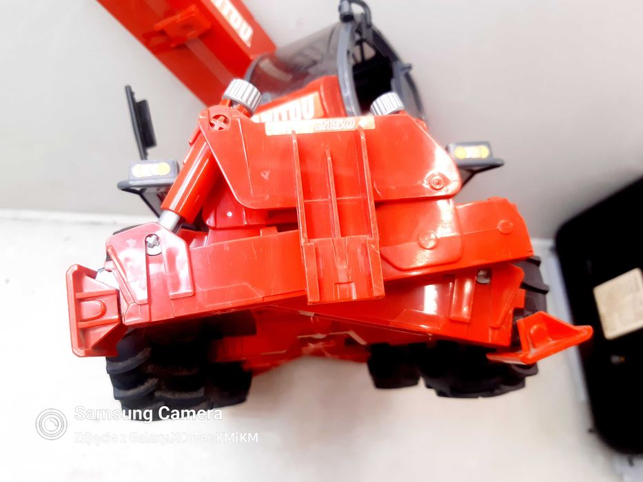 zabawka dźwig ładowarka model Bruder Manitou MRT2150 uszkodzona