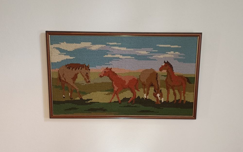 Quadro Os cavalos em meio ponto