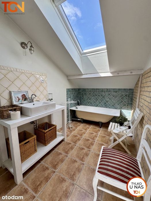 Dwupoziomowy Apartament z Ogródkiem / Teofilów