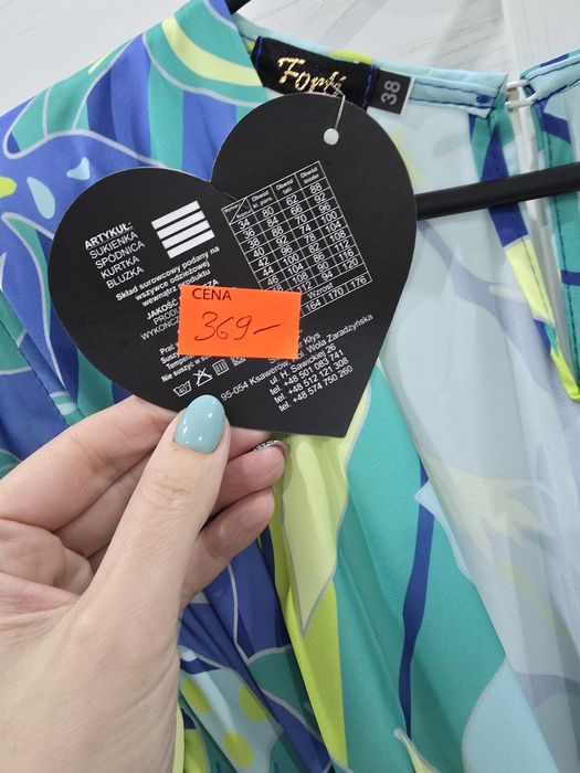 Kombinezon damski nowy 38