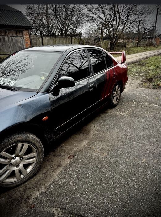 Машина міцубісі налант 8