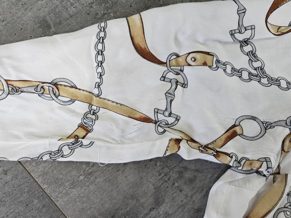 Biała bluzka koszula łańcuchy wiskoza Salko XL- XXL

Niewielka wada za