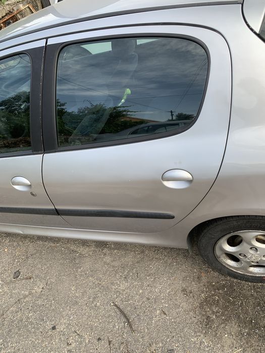 Porta tras esquerda peugeot 206