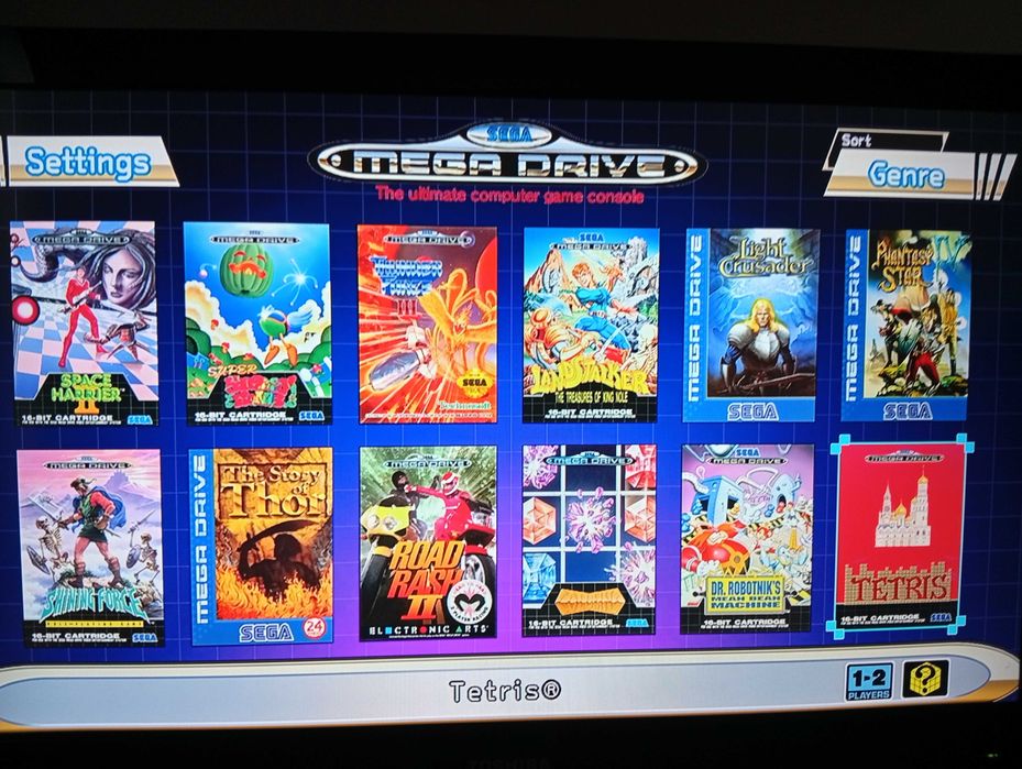 Consola Mega Drive com 2 comandos e 48 jogos