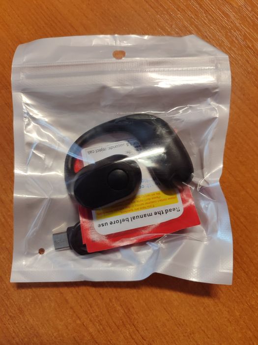 Односторонні, безпровідні навушники з мікрофоном