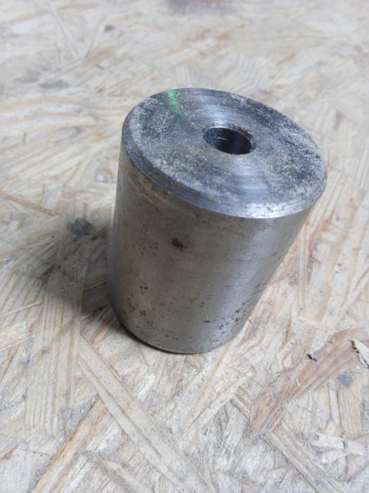 Wałek toczony średnica 49,30 mm, długość 60 mm.