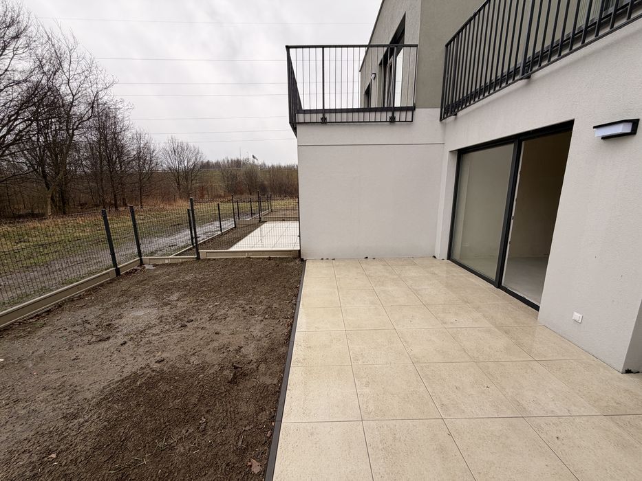 2 pokoje z tarasem i ogródkiem | os. Poligon | miejsce postojowe