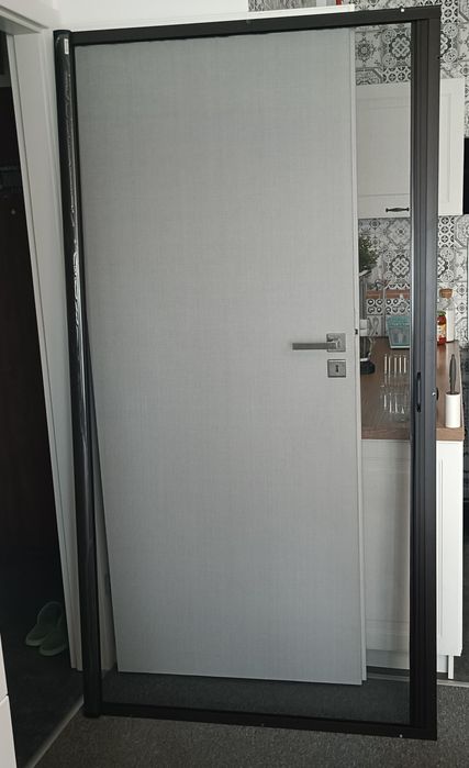 Nowa Moskitiera drzwiowa rolowana "Domondo"