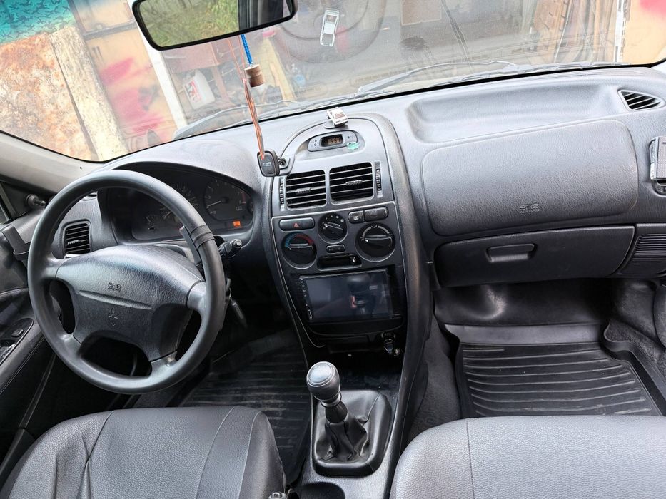 Mitsubishi Carisma 1.6 переоформлення