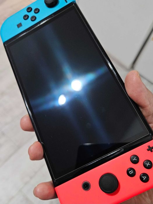 Nintendo Switch OLED Neon – idealny ekran, pudełko + gra TMNT – pełny zestaw