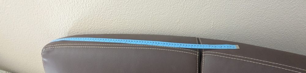 Sofá de canto em pele.