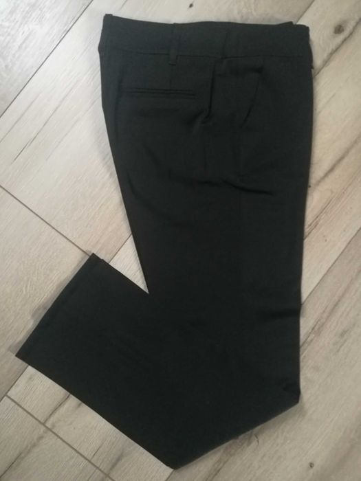 Nowe eleganckie damskie spodnie w kant RESERVED s/m