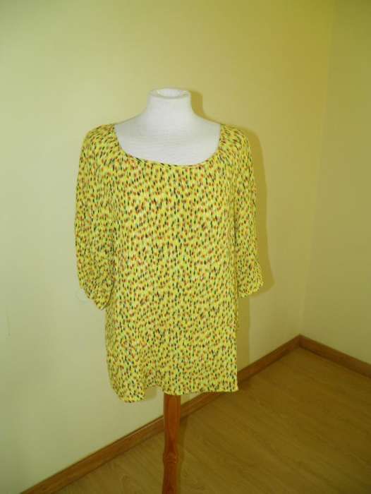 Camisa ¾ de manga, muito leve, jovial e eclética