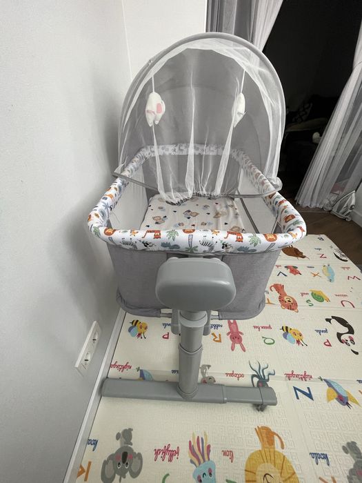 Ліжечко дитяче приставне з качалкою і музикою.