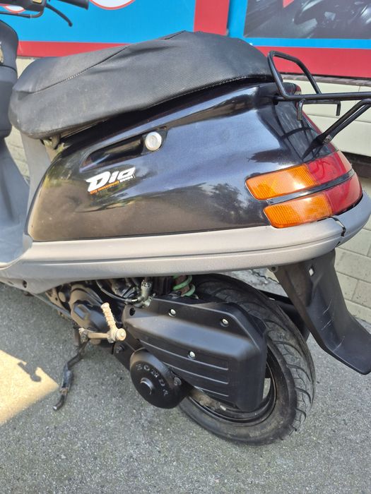Скутер Honda Tact.