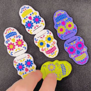 Brinquedo fidget com crânio dia de los muertos