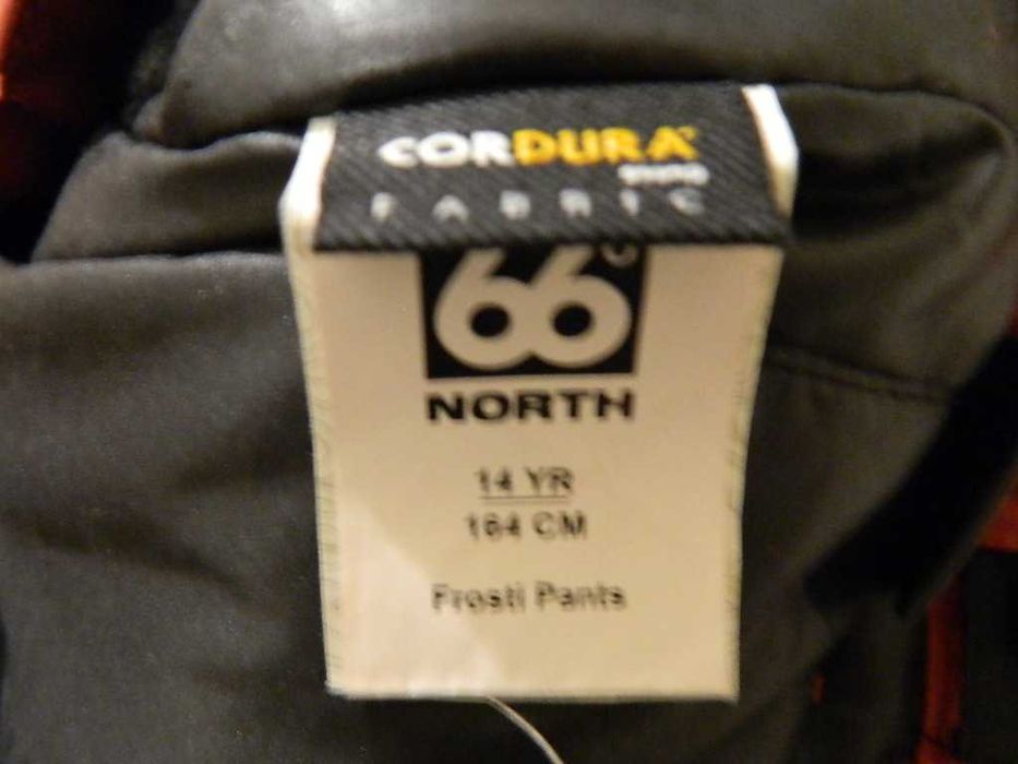 spodnie chłopięce 66 North narty snowboard materiał cordura 164cm nowe