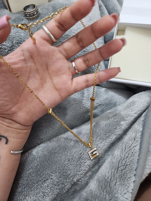 Colar banhado a ouro guess