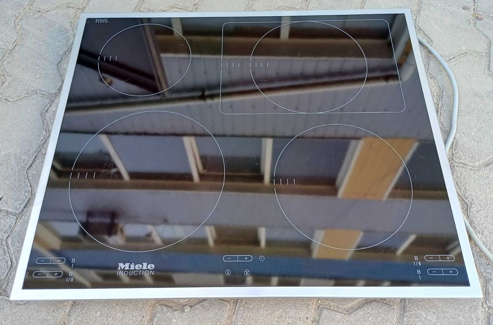 Вбудована варильна поверхня індукційна 60 см Міле Miele KM 6115 бустер б/в встраиваемая индукционная поверхность плита Миле б/у