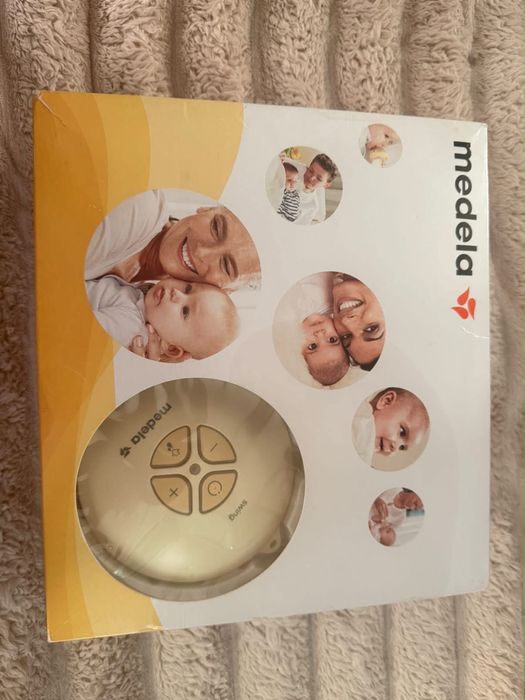 На фото изображен Medela Swing — одинарный двухфазный электрический молокоотсос