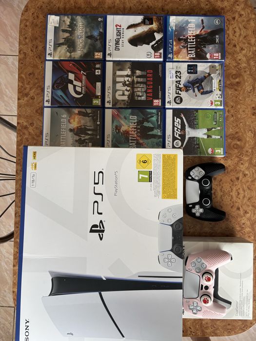 Ps5 chassis 1tb + 2 pady + 9 gier Poraj • OLX.pl