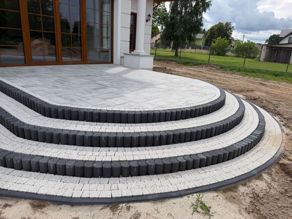 Układanie kostki brukowej i ogrodzenia