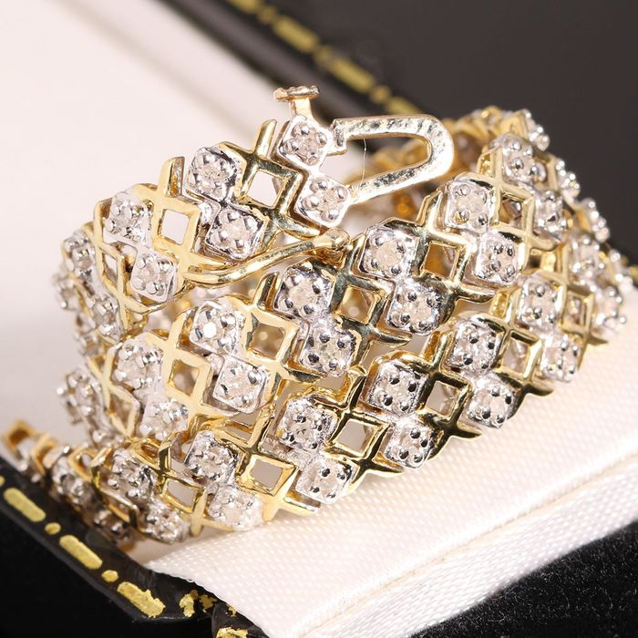 Złota bransoletka z diamentami 0.65ct szeroka 17,5cm 9K