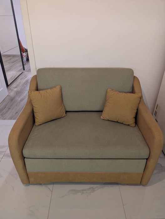 Sofa rozkładana z funkcją spania.