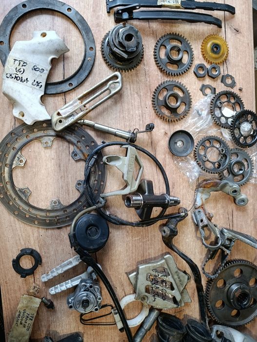 Części Yamaha TTR 600 tarcza zębatki zacisk osłona osłony linka ślizg