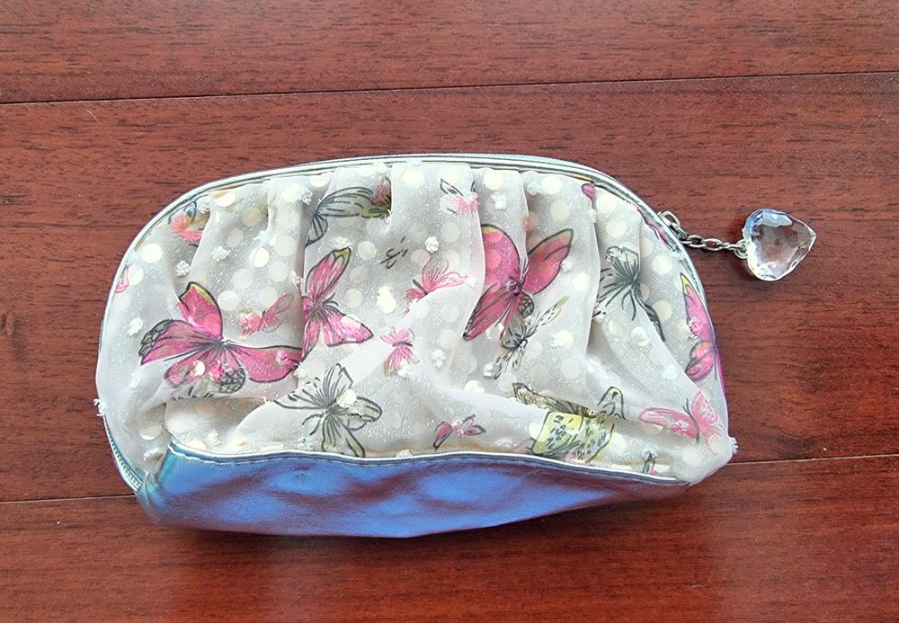 Bolsa pequena com borboletas Primark