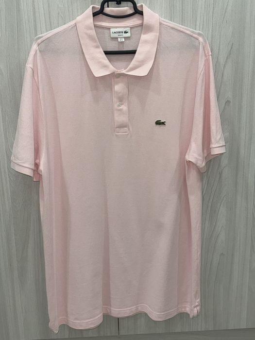 Поло Lacoste.