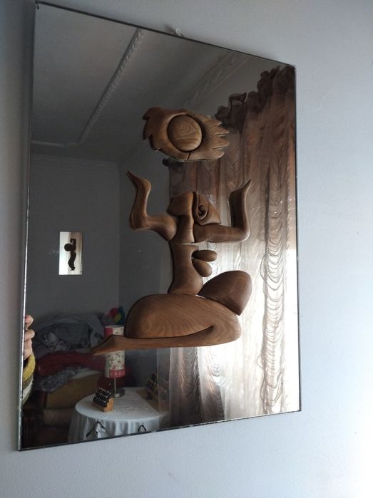 3 Estatuetas em espelho.