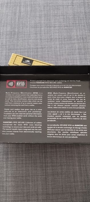 Carteira porta moedas unisexo em pele.