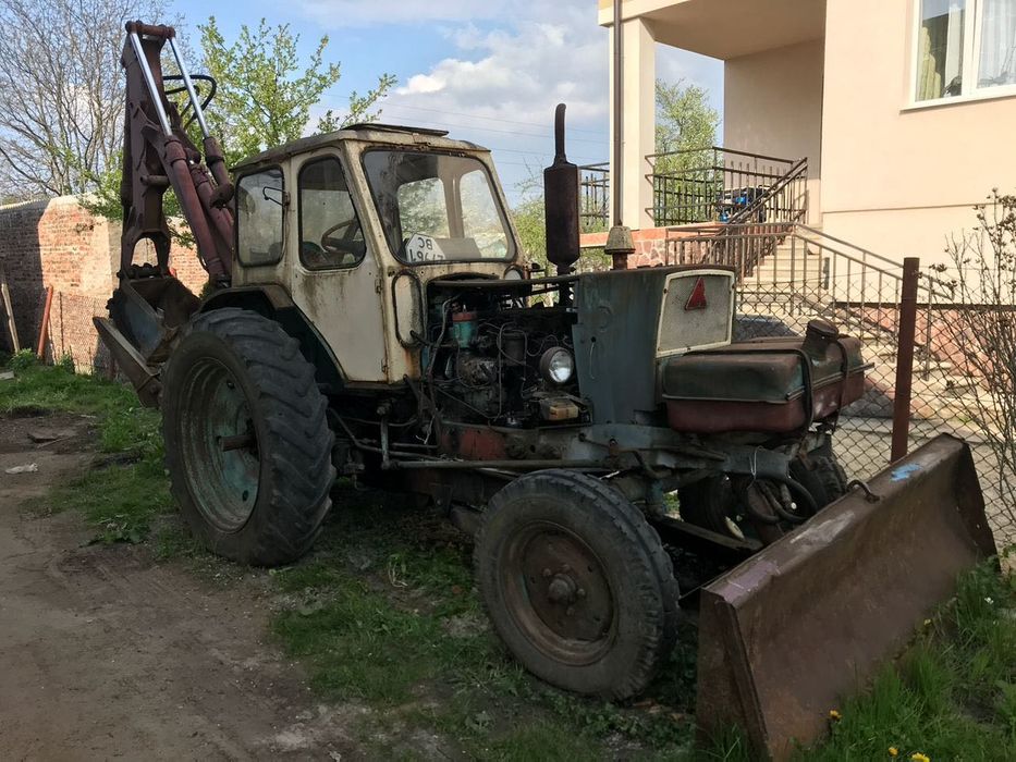 Трактор ЮМЗ (2005) ескаватор (плуги, культиватор, косарка та інше)
