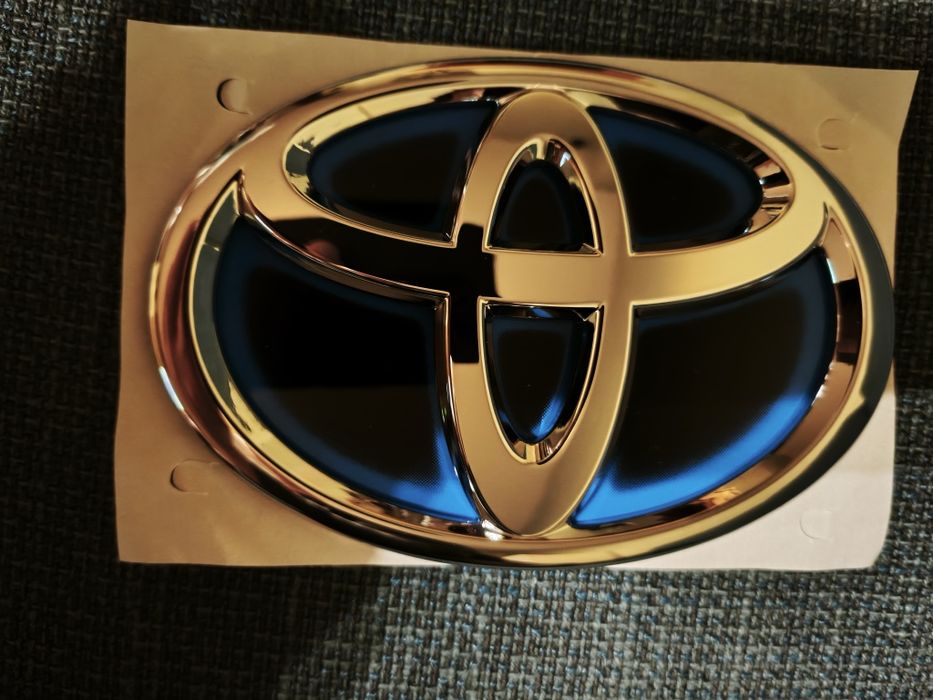 Emblemat, logo, znaczek klapy bagażnika Toyota Corolla E21