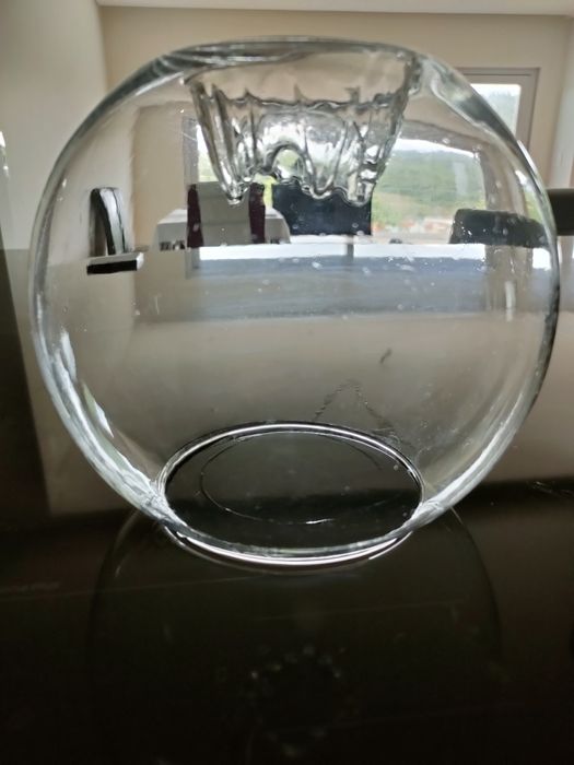 Conjunto de porta velas e aquário.