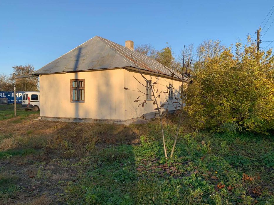 житловий будинок та земельна ділянка 46,5 сот