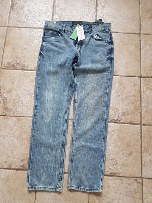 Nowe męskie spodnie Reserved rozmiar 33